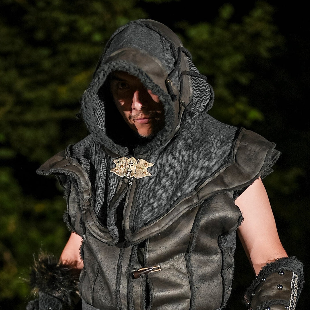 This Layered LARP Hood in Black Faux Leather has a Fleece Lining in Black. This Viking Hood is Water Resistant towards rain. The Medieval Hood covers your shoulders and provides warmth. Perfect for your LARP Character and LARP Costume, Cosplay Event, and Ren Faire.