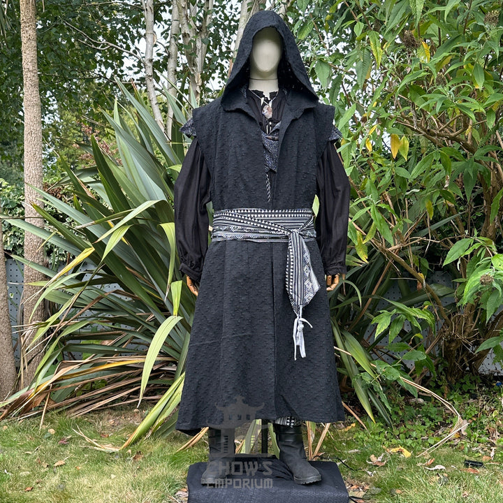 Medieval LARP costume front view featuring black sleeveless robe, leather belt and sash. For Renaissance Faire and historical roleplay events.