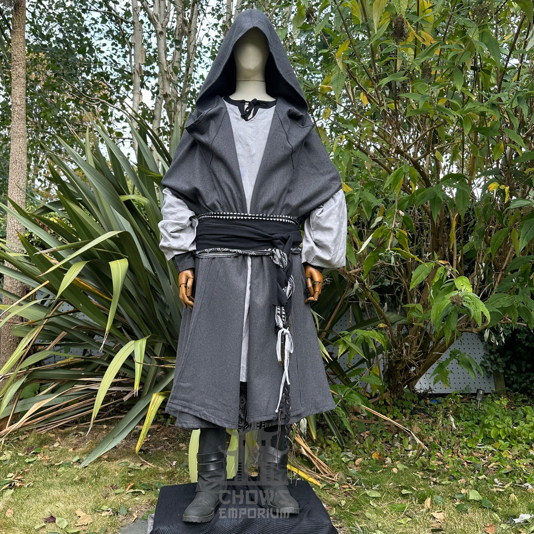 Medieval LARP costume front view featuring hooded cloak, tunic, black and white trousers and sash - ideal for cosplay, LARP, and Renaissance Faire wear.