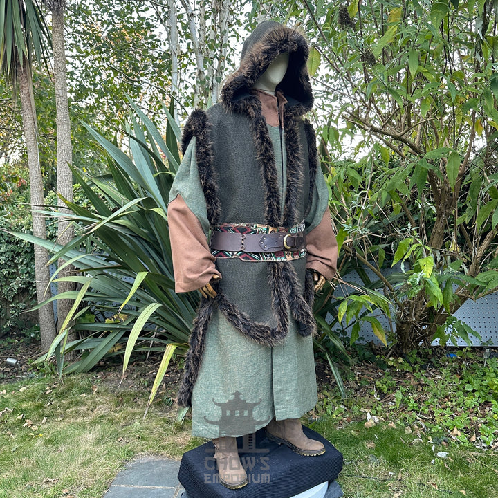 Medieval LARP costume side view, featuring a green faux fur trim hooded cape, high collared robe and sash. For Renaissance Faire and historical roleplay events.
