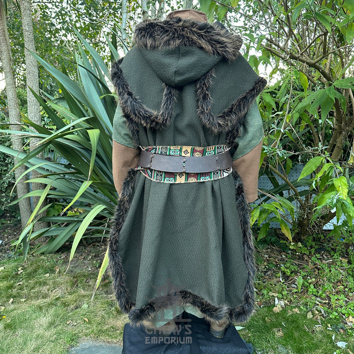Medieval LARP costume back view, featuring a green faux fur trim hooded cape, high collared robe, leather belt, sash and necklace. For Renaissance Faire and historical roleplay events.