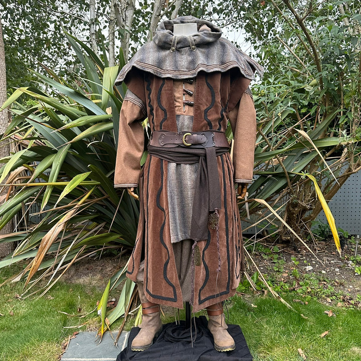This LARP Hood in Brown & Grey Moahir Wool has extended dangling arms that can wrap around in various styles. This Viking Hood is Water Resistant towards rain. The Medieval Hood covers your shoulders and provides warmth. Perfect for your LARP Character and LARP Costume, Cosplay Event, and Ren Faire.