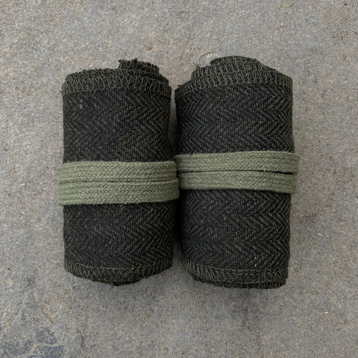 Set of Medieval LARPing Arm Wraps, Leg Wraps, and Decorative LARP sash. They are coloured Green & Black, made out of a Herringbone Wool mixture which is used to keep sleeves and trousers out of the way and you warm. These Viking Arm & Leg Wraps, and Sash are perfect for your LARP character, Cosplay event, or Ren Faire. 
