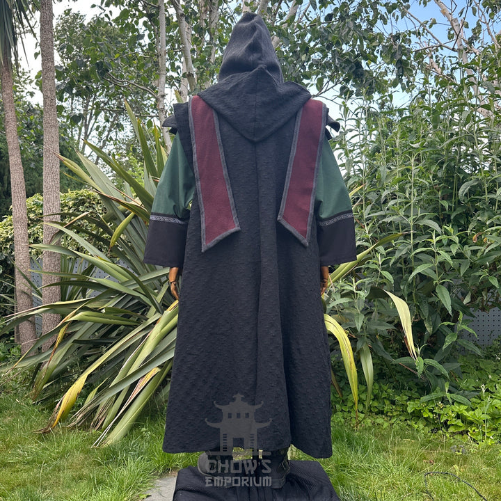 Medieval LARP costume back view featuring sleeveless robe, tunic, hood, pants, belt and sash. For Renaissance Faire and historical roleplay events.