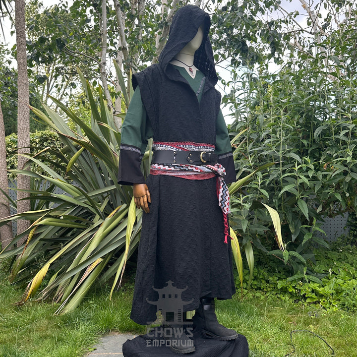 Medieval LARP costume side view featuring sleeveless robe, tunic, hood, pants, belt and sash. For Renaissance Faire and historical roleplay events.