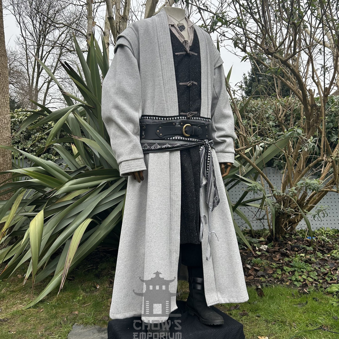 Medieval LARP costume side view, featuring a light grey full length robe, two-tone jacket, shirt, trousers, and accessories. For Renaissance Faire and historical roleplay events.