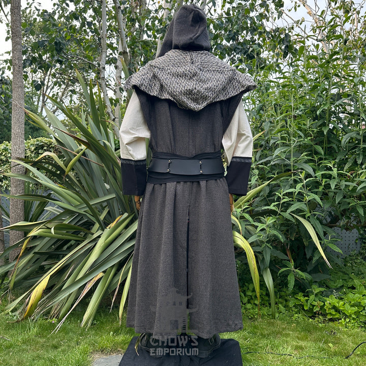 Medieval LARP costume back view featuring brown sleeveless robe, tunic, trousers, hood, belt and sash. For Renaissance Faire and historical roleplay events.