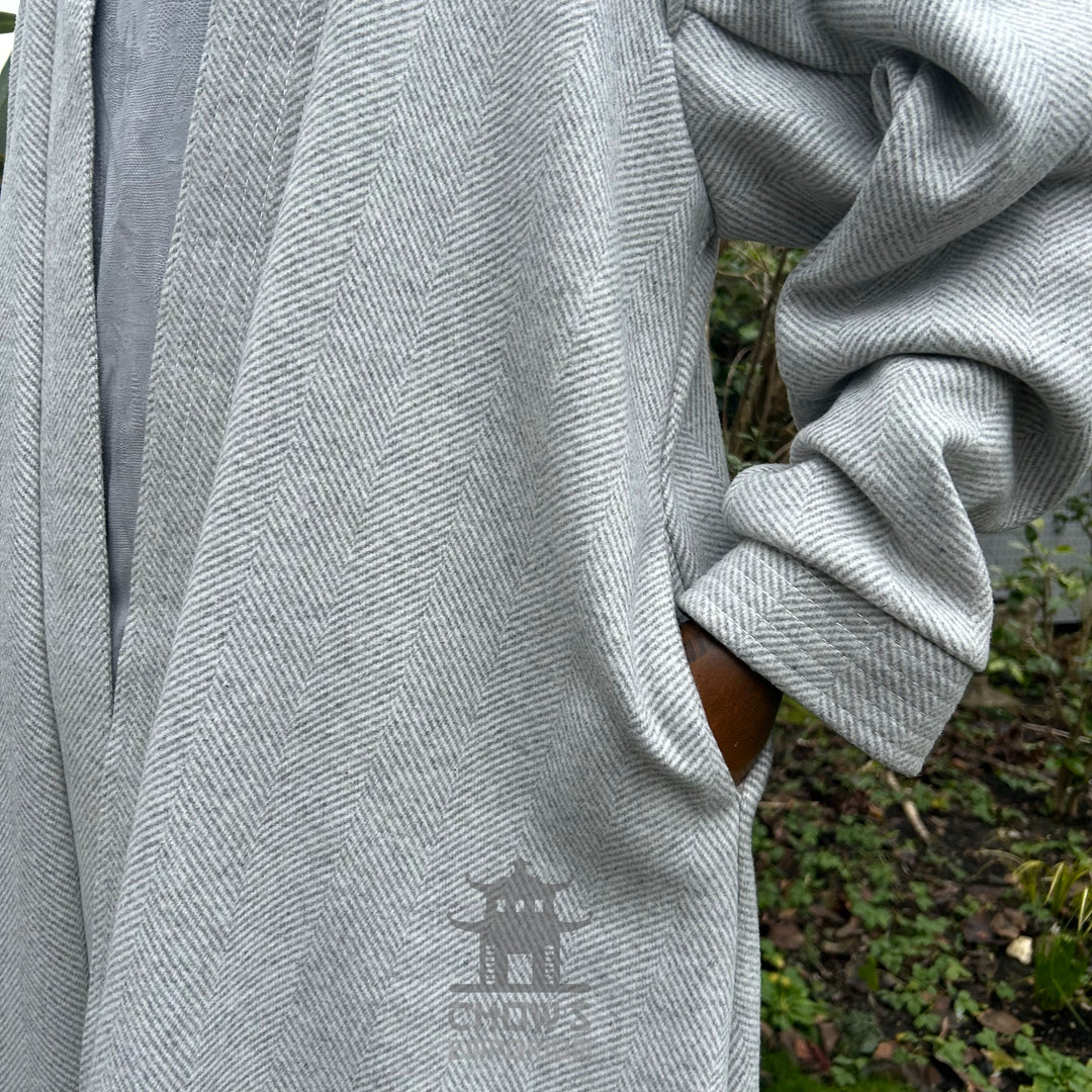 Pocket detail on light grey herringbone medieval LARP robe, authentic fantasy cosplay costume for Renaissance Faires and roleplay events