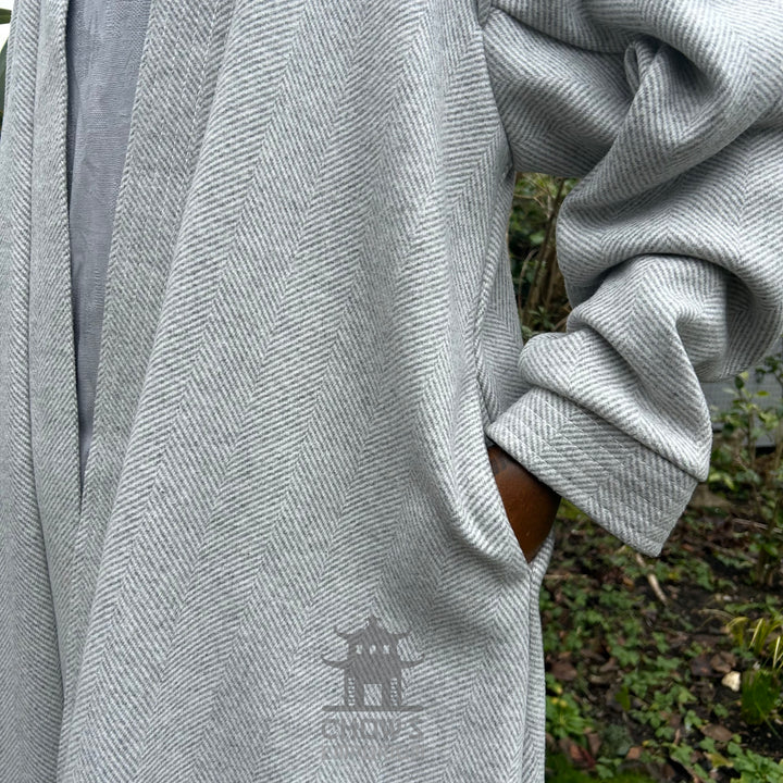 Pocket detail on light grey herringbone medieval LARP robe, authentic fantasy cosplay costume for Renaissance Faires and roleplay events