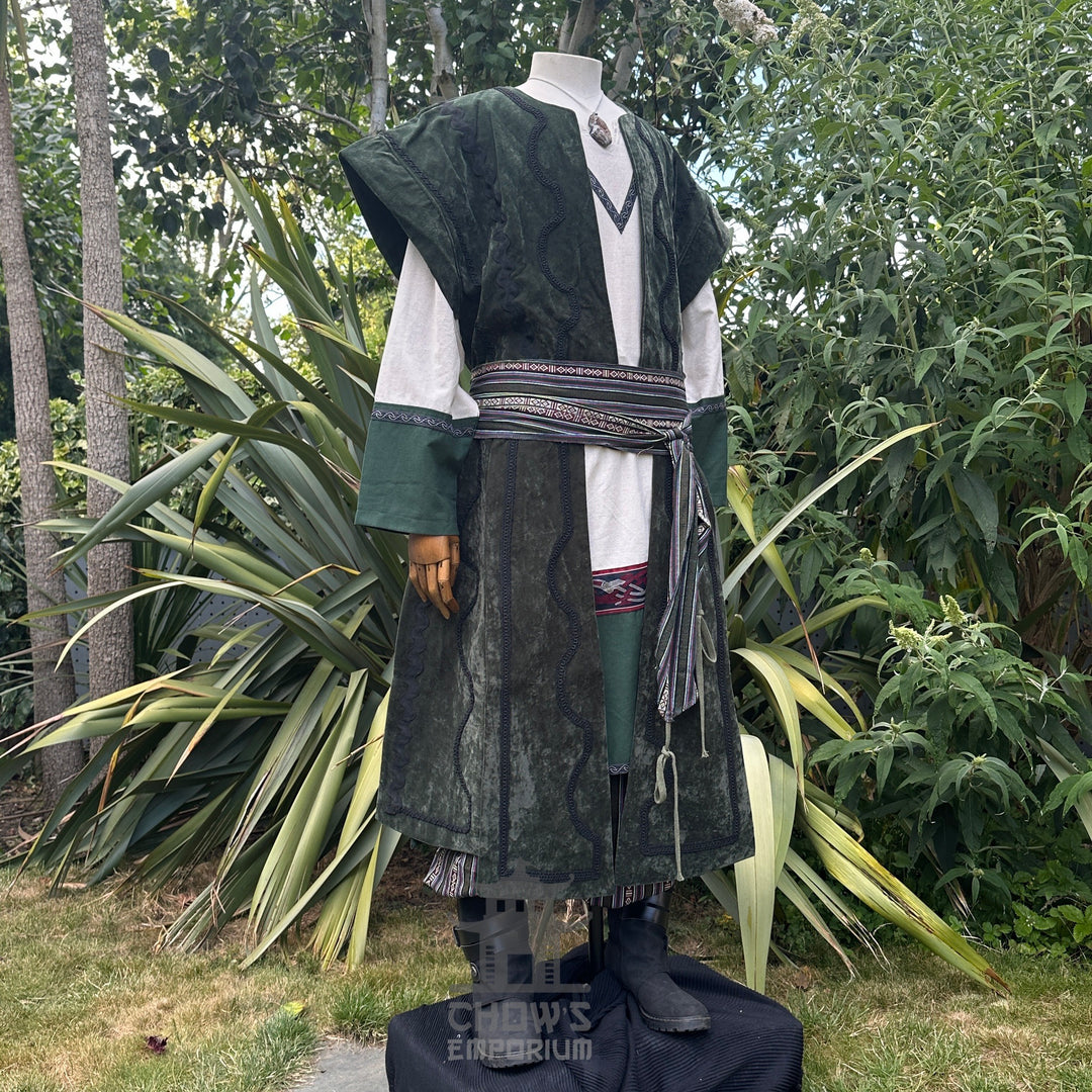 Medieval LARP costume side view featuring waistcoat, tunic, pants, belt and sash. For Renaissance Faire and historical roleplay events.