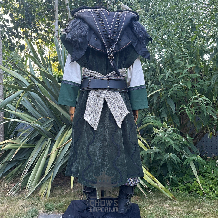 Medieval LARP costume back view featuring waistcoat, tunic, hood, vambraces, trousers, and accessories. For Renaissance Faire and historical roleplay events.