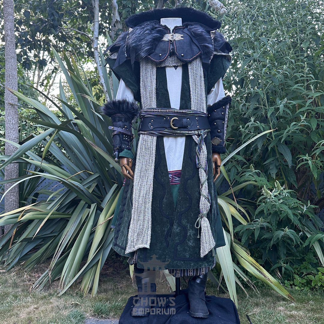 Medieval LARP costume front view featuring waistcoat, tunic, hood, vambraces, trousers, and accessories. For Renaissance Faire and historical roleplay events.
