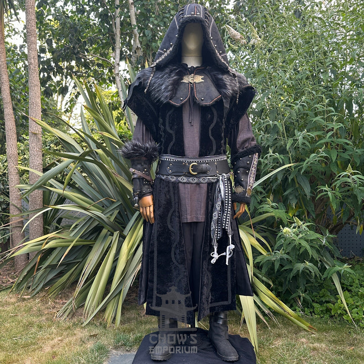 Medieval LARP costume front view featuring waistcoat, hood, vambraces, shirt, trousers, belt, and sash. For Renaissance Faire and historical roleplay events.