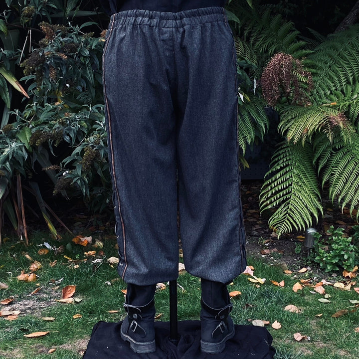 Back view of grey straight-leg LARP trousers showing elastic waistband and relaxed fit