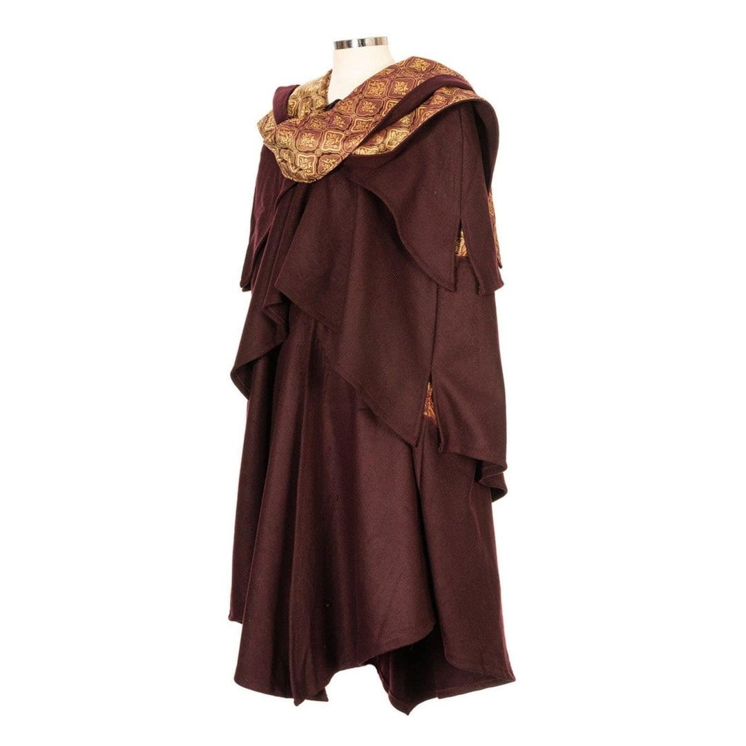 This Layered Woollen LARP Cloak in Red has multiple tiers of folded fabric to keep you warm and enhance your kit. The Viking Cloak has a Hood attached that, along with the LARP Cloak, keep you warm and dry. The Medieval Cape has a Gold Lining to add flare to your LARP Character, Cosplay Event, or Ren Faire.