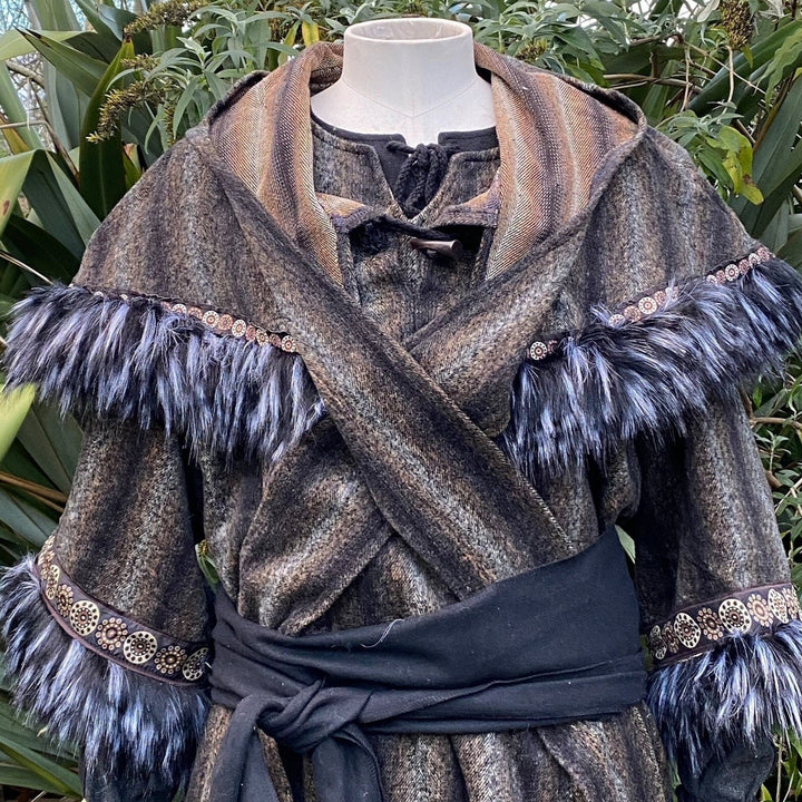This LARP Hood in Brown & Black Moahir Wool has Faux Fur Trimming in Black & Grey with Braiding. This Viking Hood is Water Resistant towards rain. The Medieval Hood covers your shoulders and provides warmth. Perfect for your LARP Character and LARP Costume, Cosplay Event, and Ren Faire.