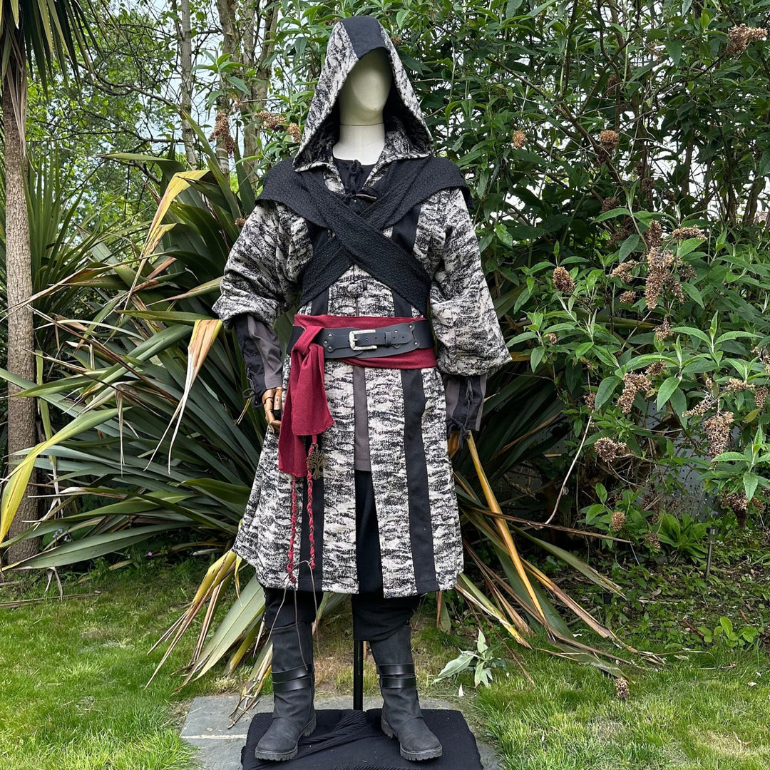 Medieval LARP costume front view, featuring brown and black hooded robe, wool hood, shirt, trousers and sash. For Renaissance Faire and historical roleplay events.