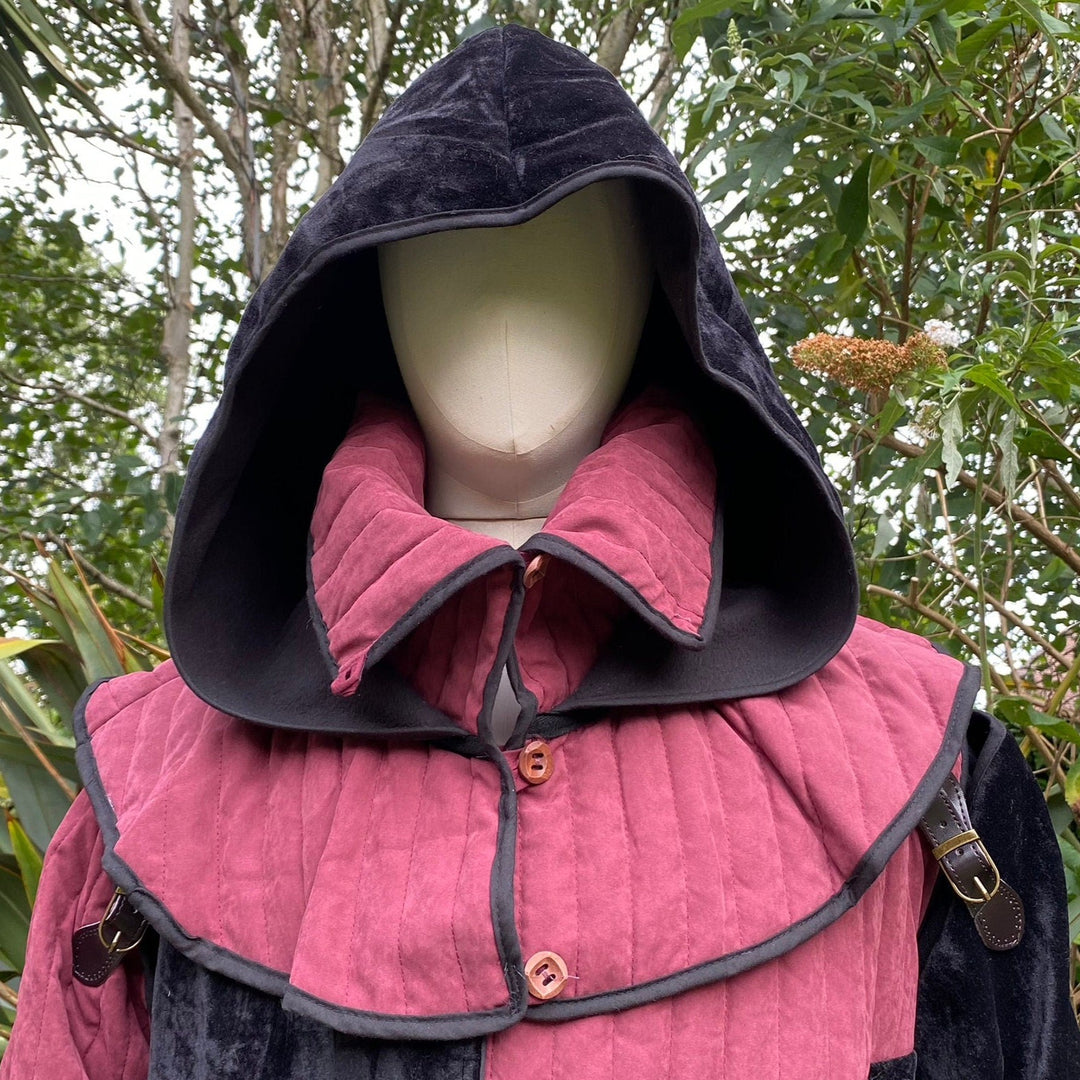 This Padded LARP Hood comes in Black and Red Faux Suede. This Viking Hood has a Snood style, and is Water Resistant. The Gambeson Mantle of the Medieval Hood keeps you warm and dry. Perfect for your LARP Character and LARP Costume, Cosplay Event, and Ren Faire.