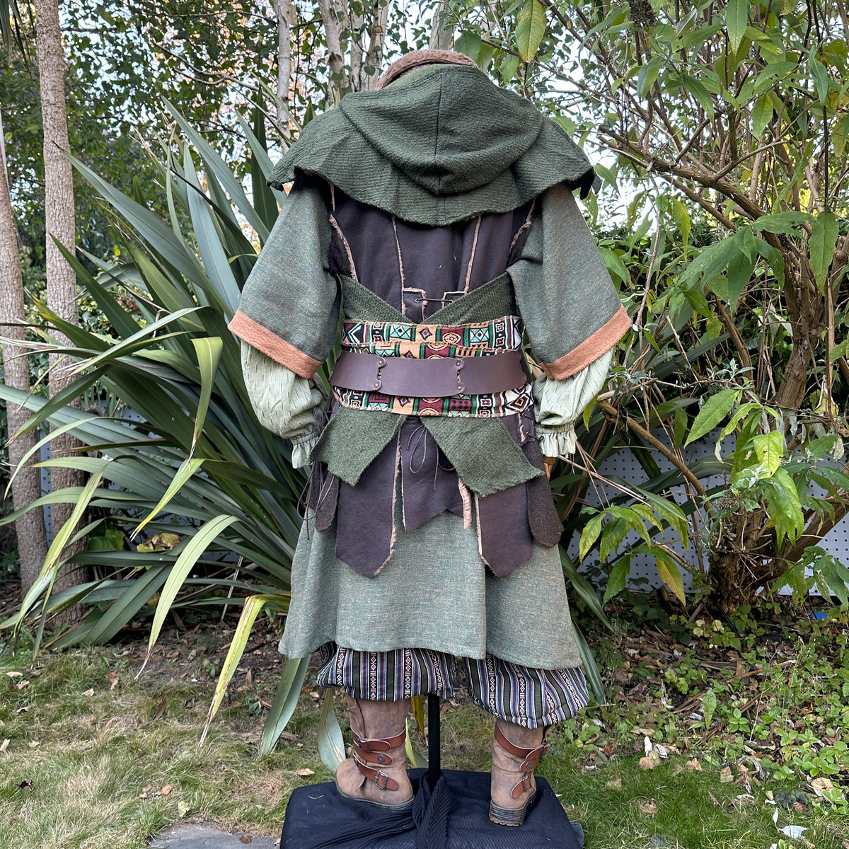 Green wool LARP scarf hood from the back, draped over a medieval outfit.