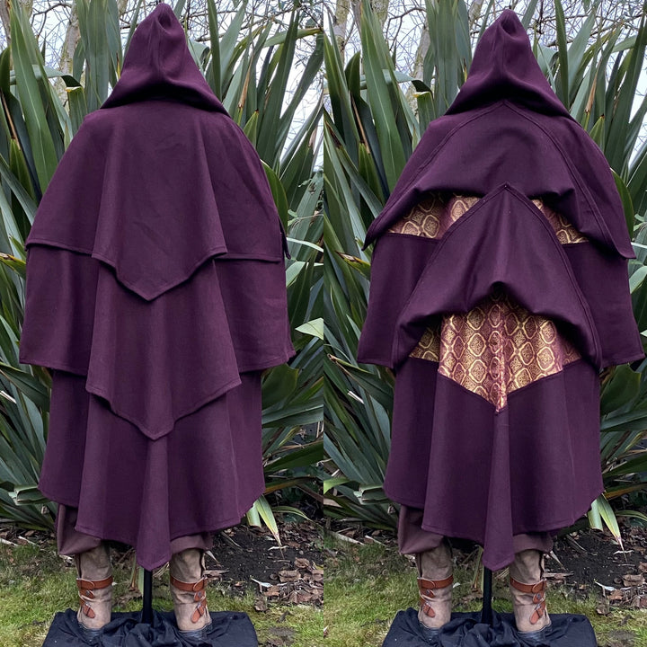This Layered Woollen LARP Cloak in Red has multiple tiers of folded fabric to keep you warm and enhance your kit. The Viking Cloak has a Hood attached that, along with the LARP Cloak, keep you warm and dry. The Medieval Cape has a Gold Lining to add flare to your LARP Character, Cosplay Event, or Ren Faire. 
