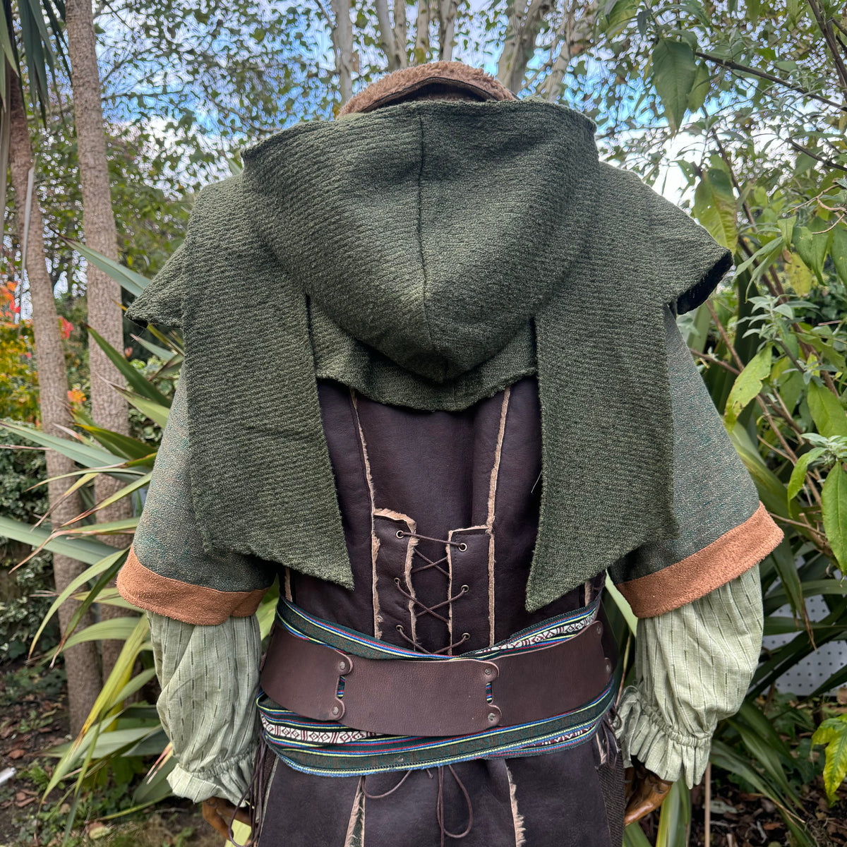 Green wool scarf hood in medieval style, rear view.