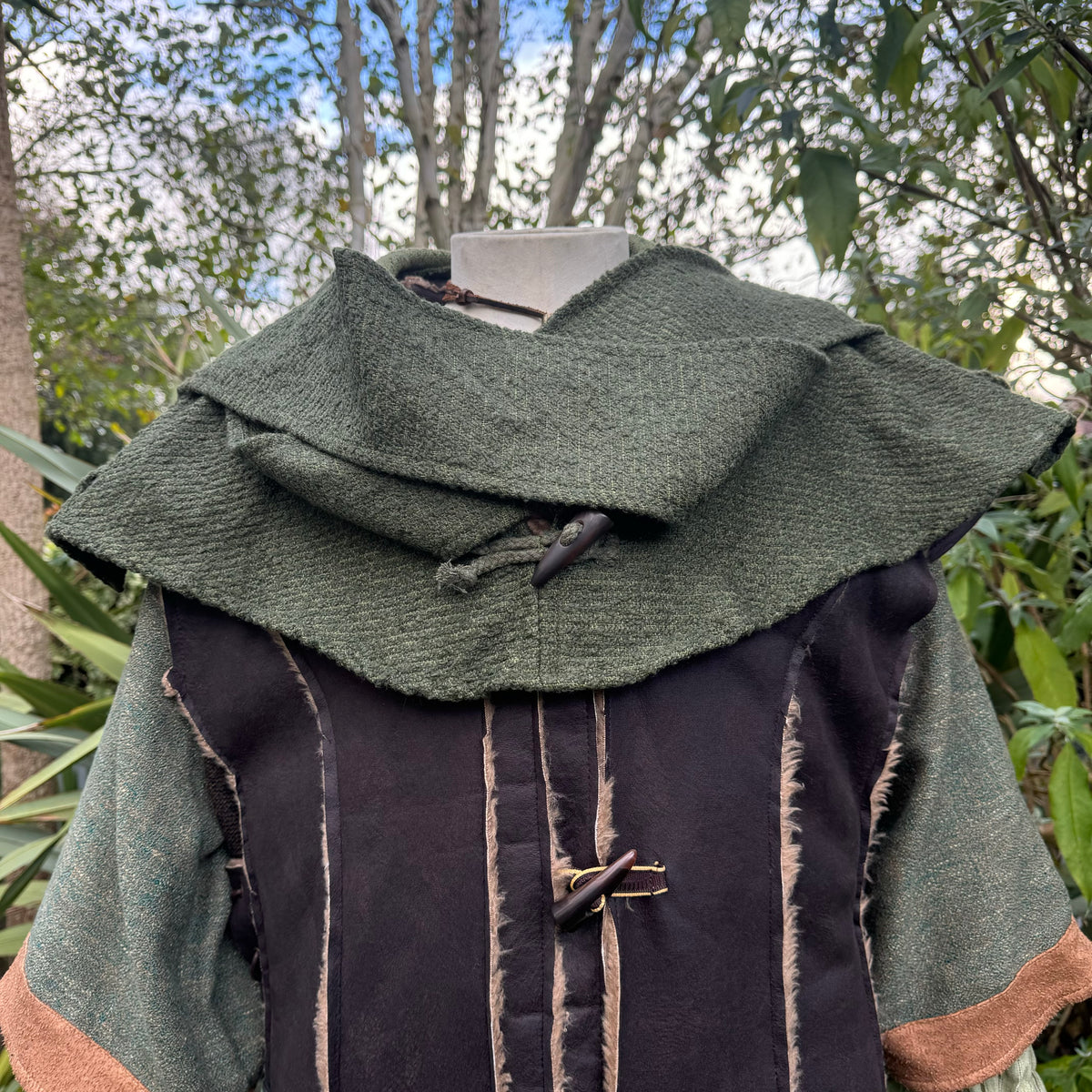 Green wool scarf hood in medieval style, front view, suitable for LARP.