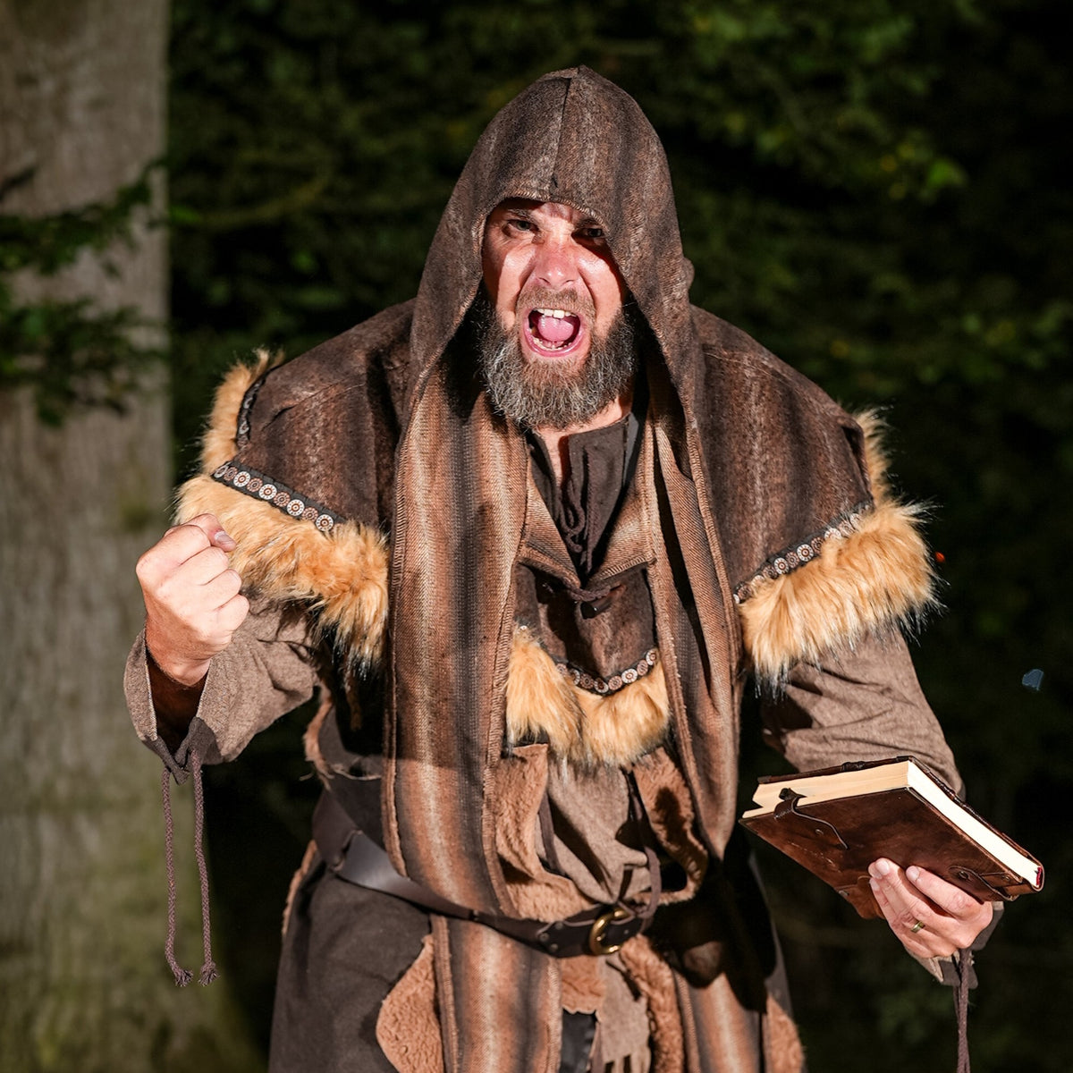 LARP medieval hood in action, brown faux fur, rugged.