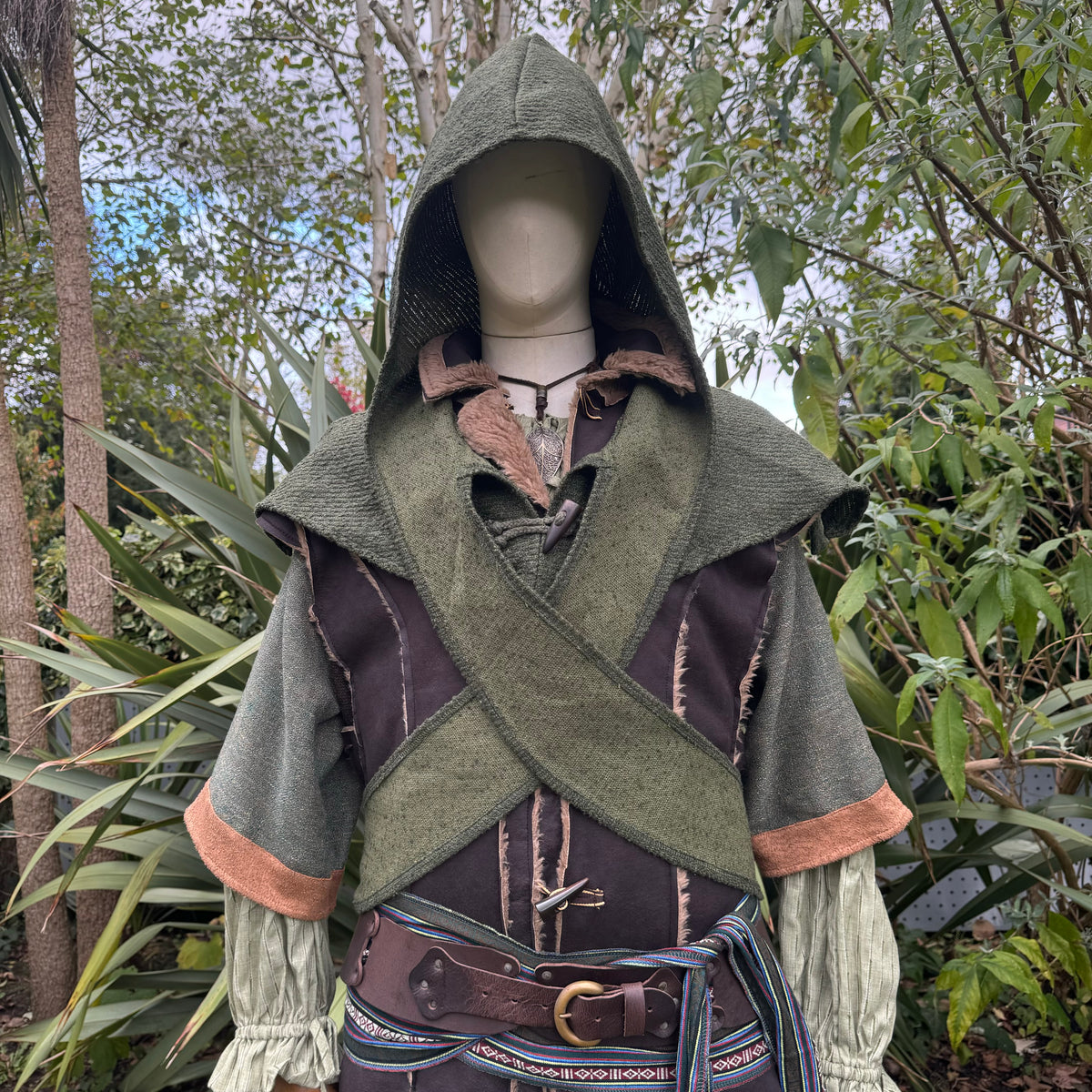 Green wool scarf hood for medieval LARP costume, front view.