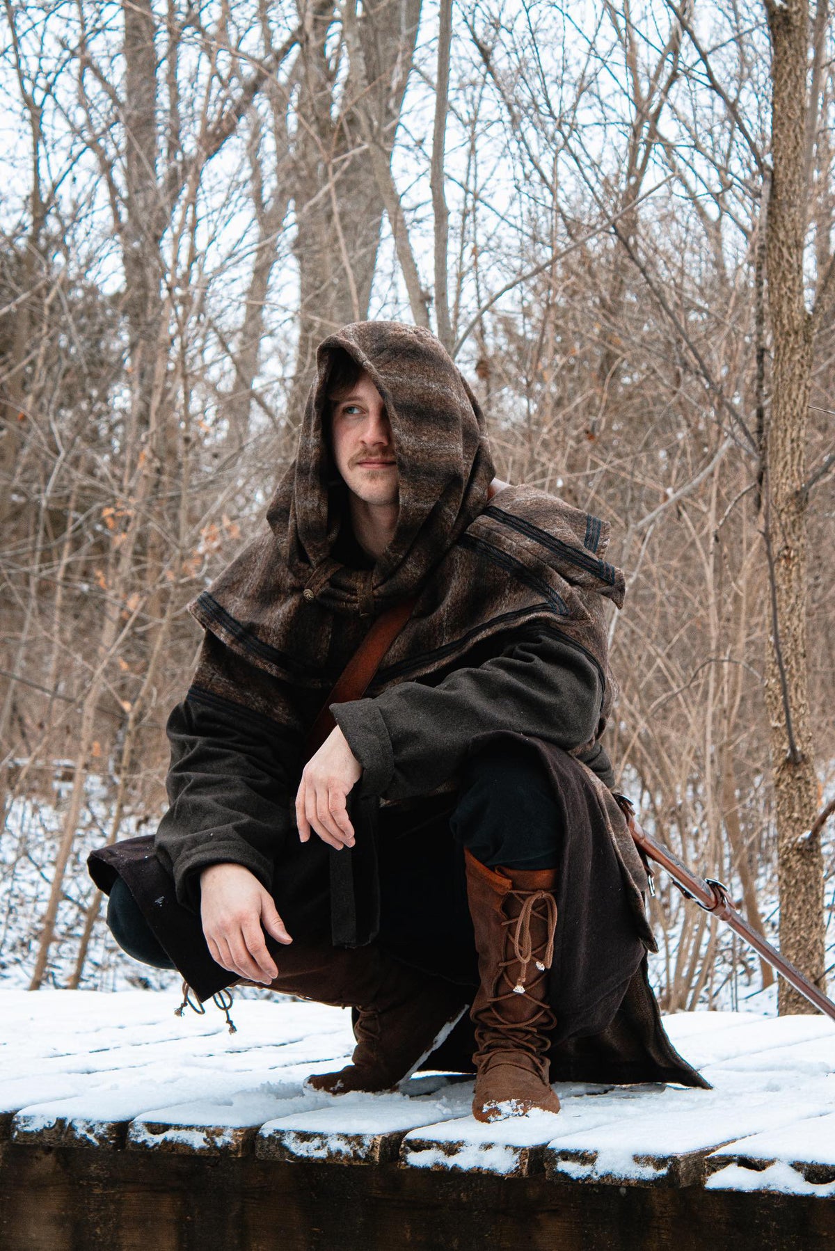 Brown mohair snood hood for LARP in snowy forest setting.
