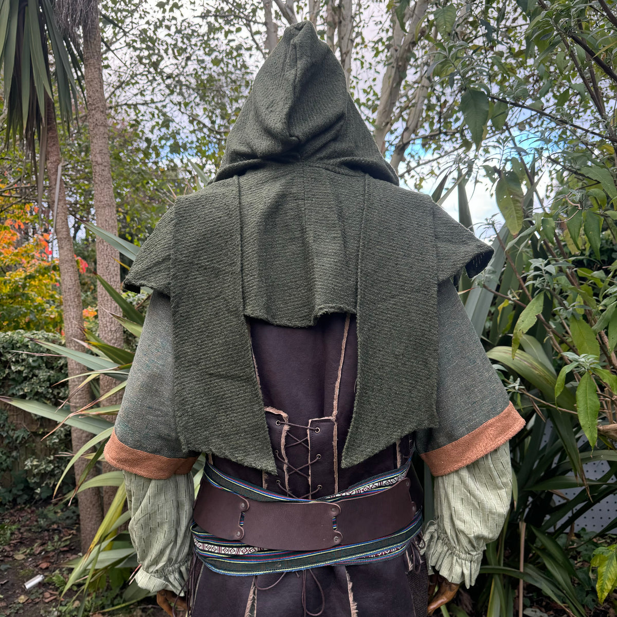 Green wool scarf hood from the back, perfect for medieval LARP events.