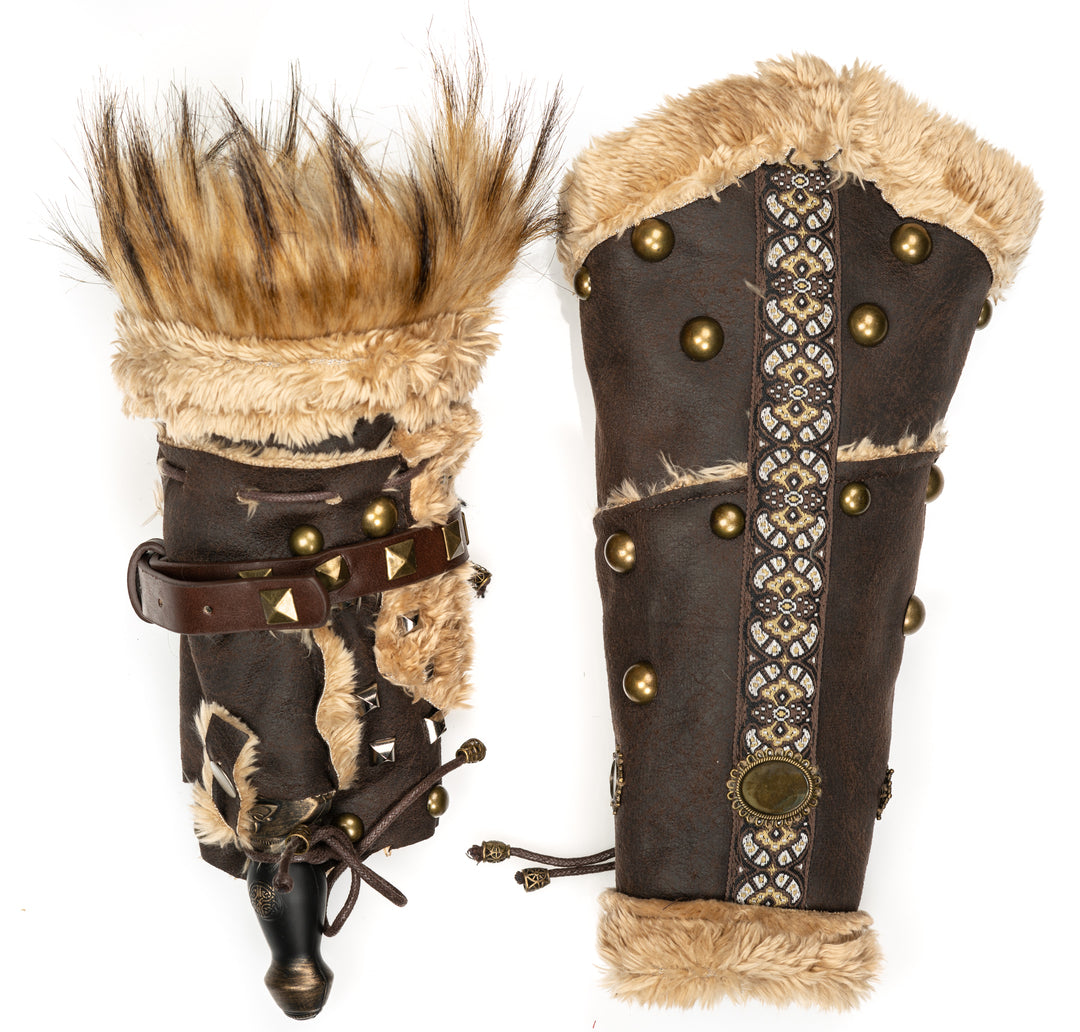 Brown leather vambraces with fur trim and studs, ideal for medieval LARP events.