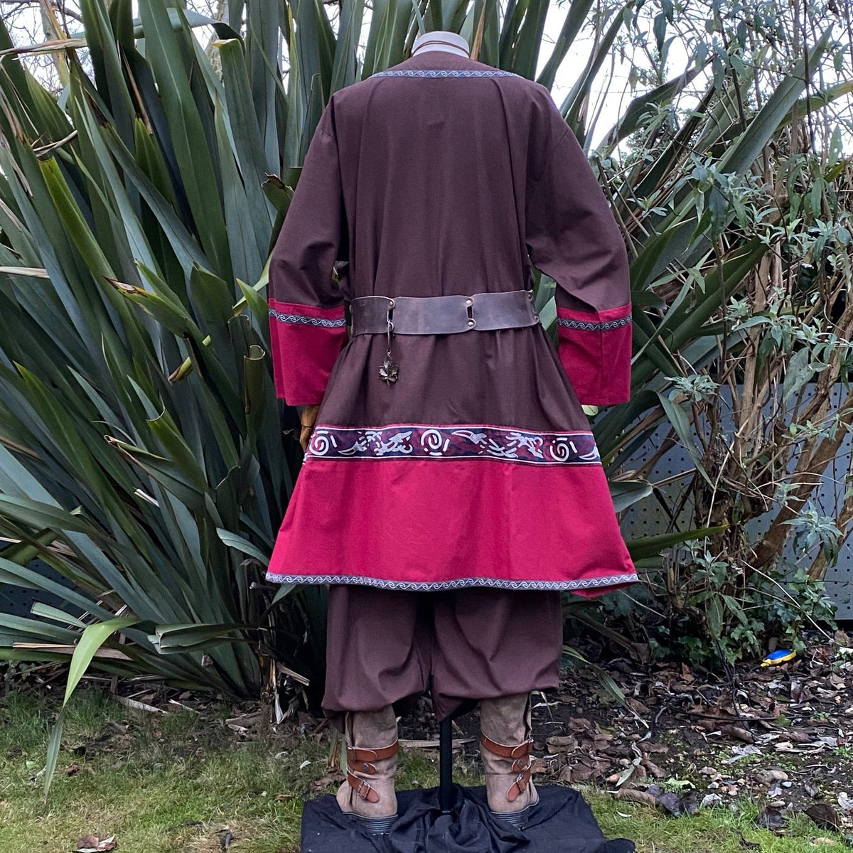 Brown and red LARP tunic, hood, and pants from the back, medieval style.