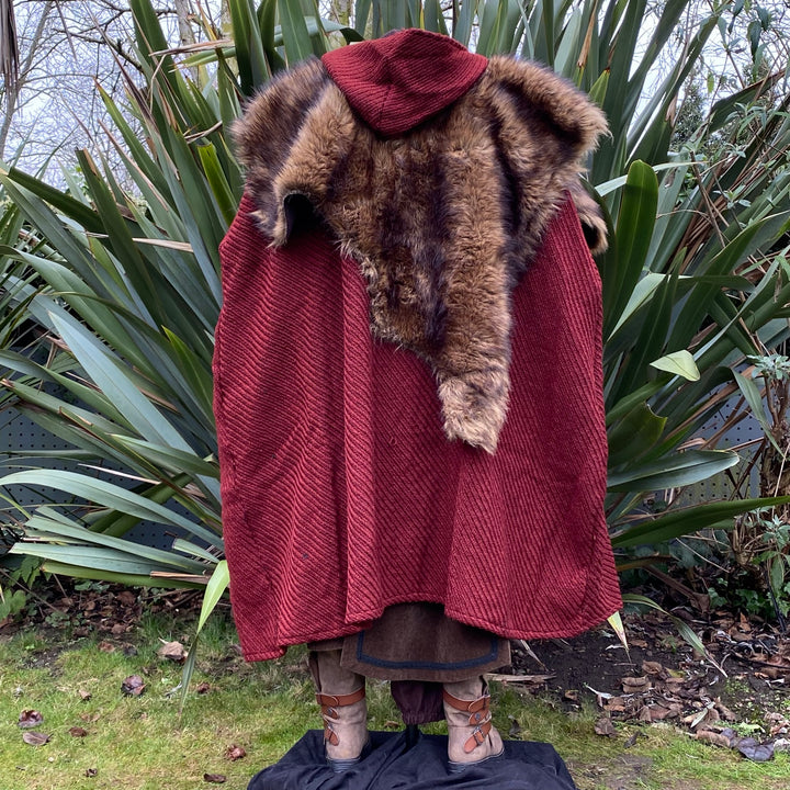 This LARP Cloak in Red Wool has two Cross Over Straps that can tie together, or into existing costume. The Medieval Cloak is Water Resistant and helps keep you warm. The Viking Cape's Wrap Around Straps help keep the cape on your shoulders; perfect for your LARP character, Cosplay Events, and Ren Faires. 