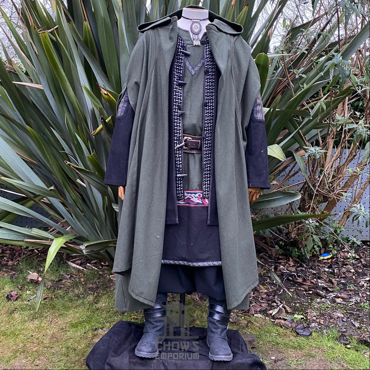 Medieval LARP outfit front view, featuring a green hooded cloak, jacket, tunic, trousers, belt and sash. For Renaissance Faire and historical roleplay events.