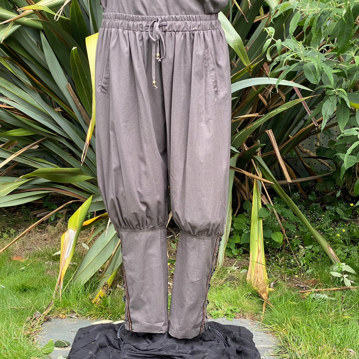 side braiding medieval trousers in grey cotton.