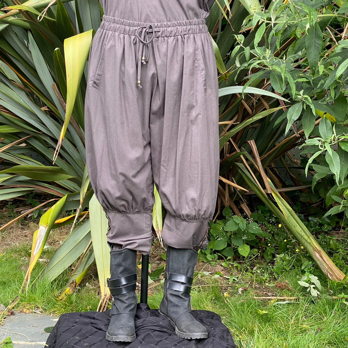 grey cotton viking pants with braided trim for LARP.