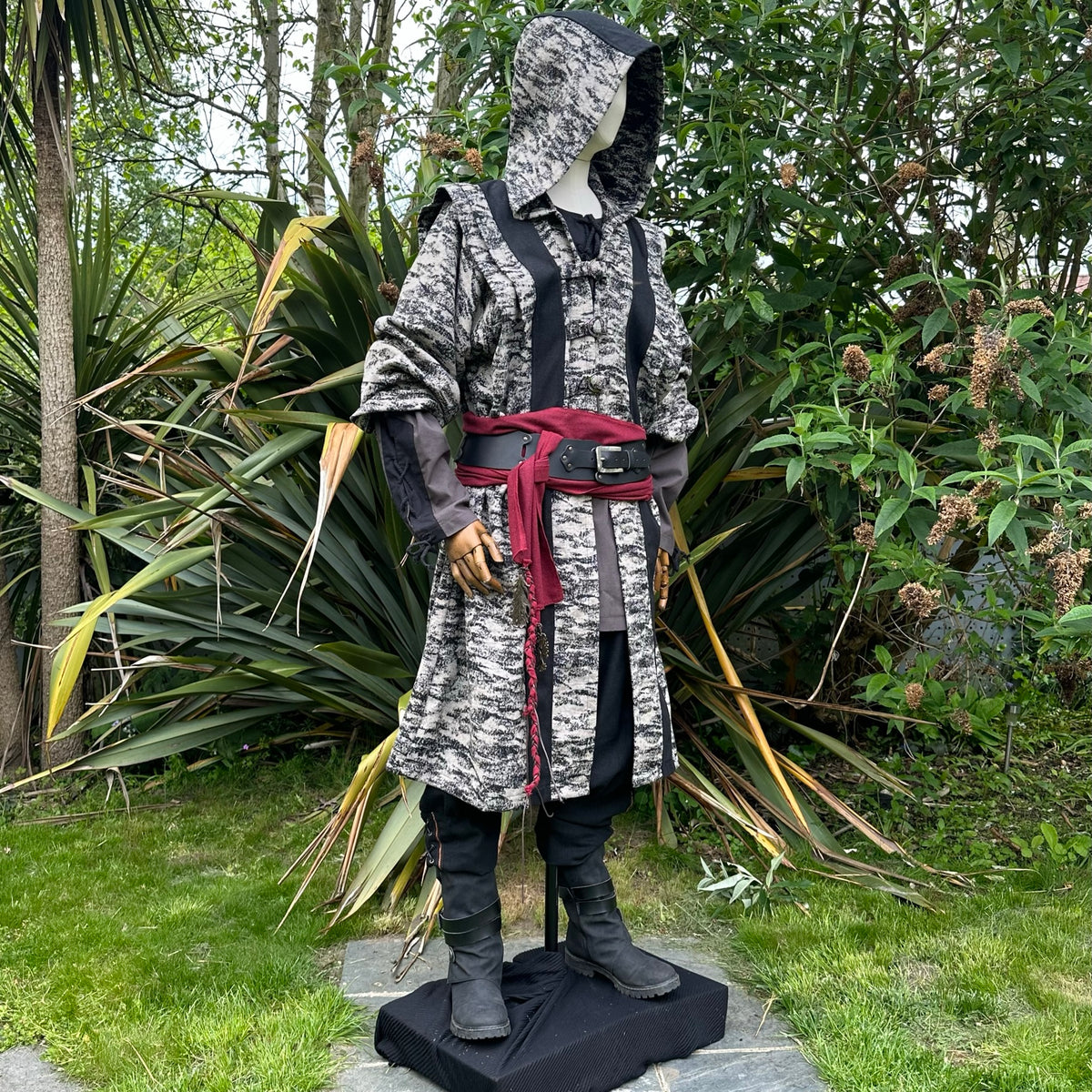 LARP battle mage outfit in mottled grey with hood and red belt.