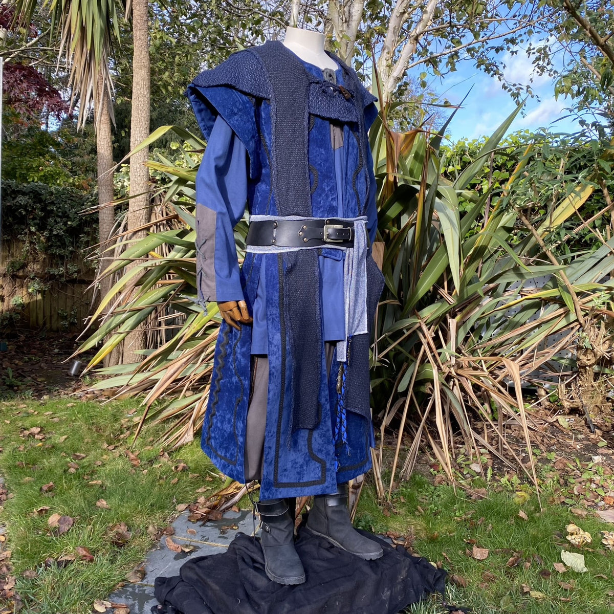 Three-quarter view of blue fantasy waistcoat with structured shoulders for LARP or Renaissance.