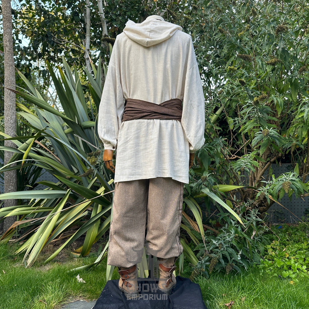 Medieval LARP outfit back view, featuring a hooded shirt, trousers, and sash. For Renaissance Faire and historical roleplay events.