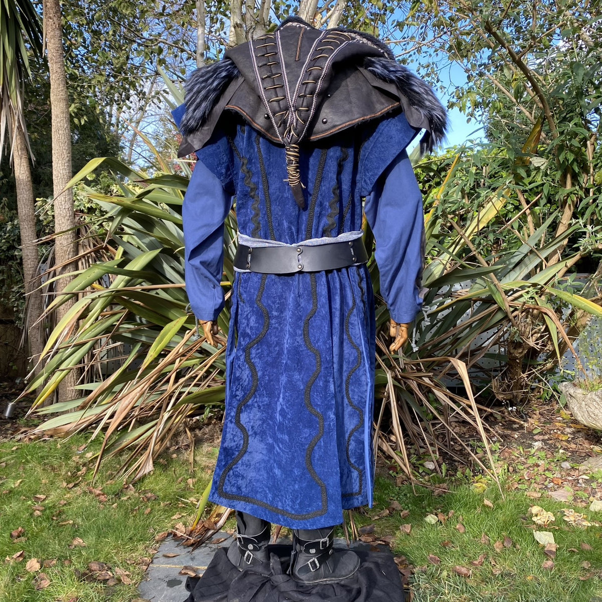 Back view of blue velvet Storm Mage LARP set with ornate hood and belt.