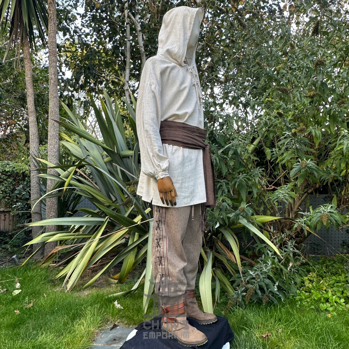 Natural LARP outfit with hooded shirt, pants, and sash.