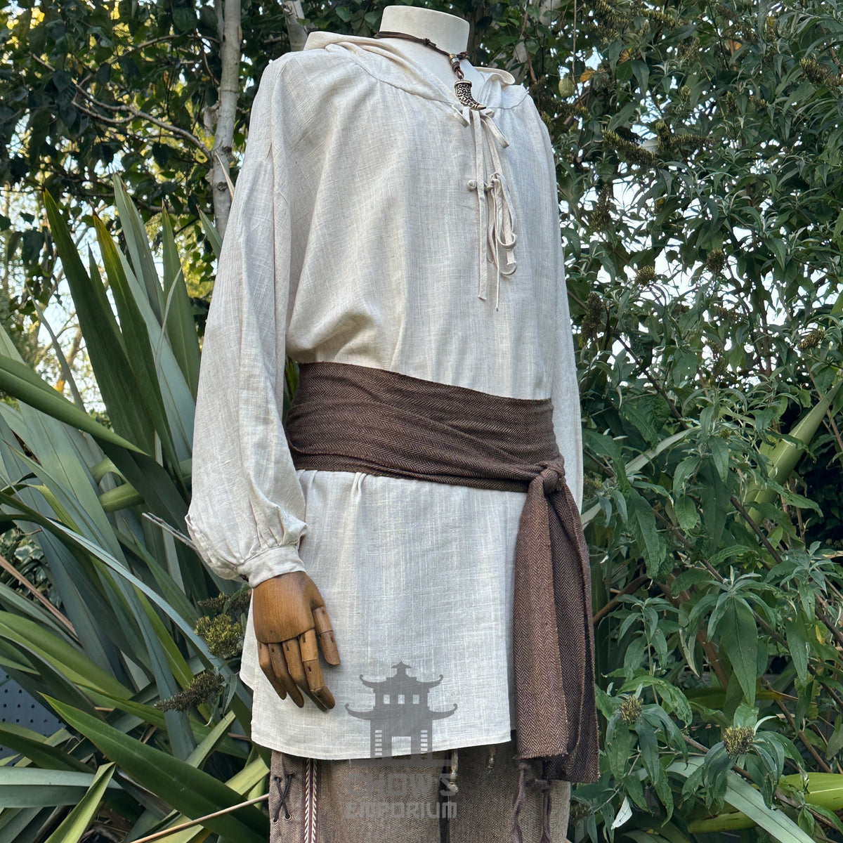 Natural LARP medieval outfit with hooded shirt, brown sash, side view.