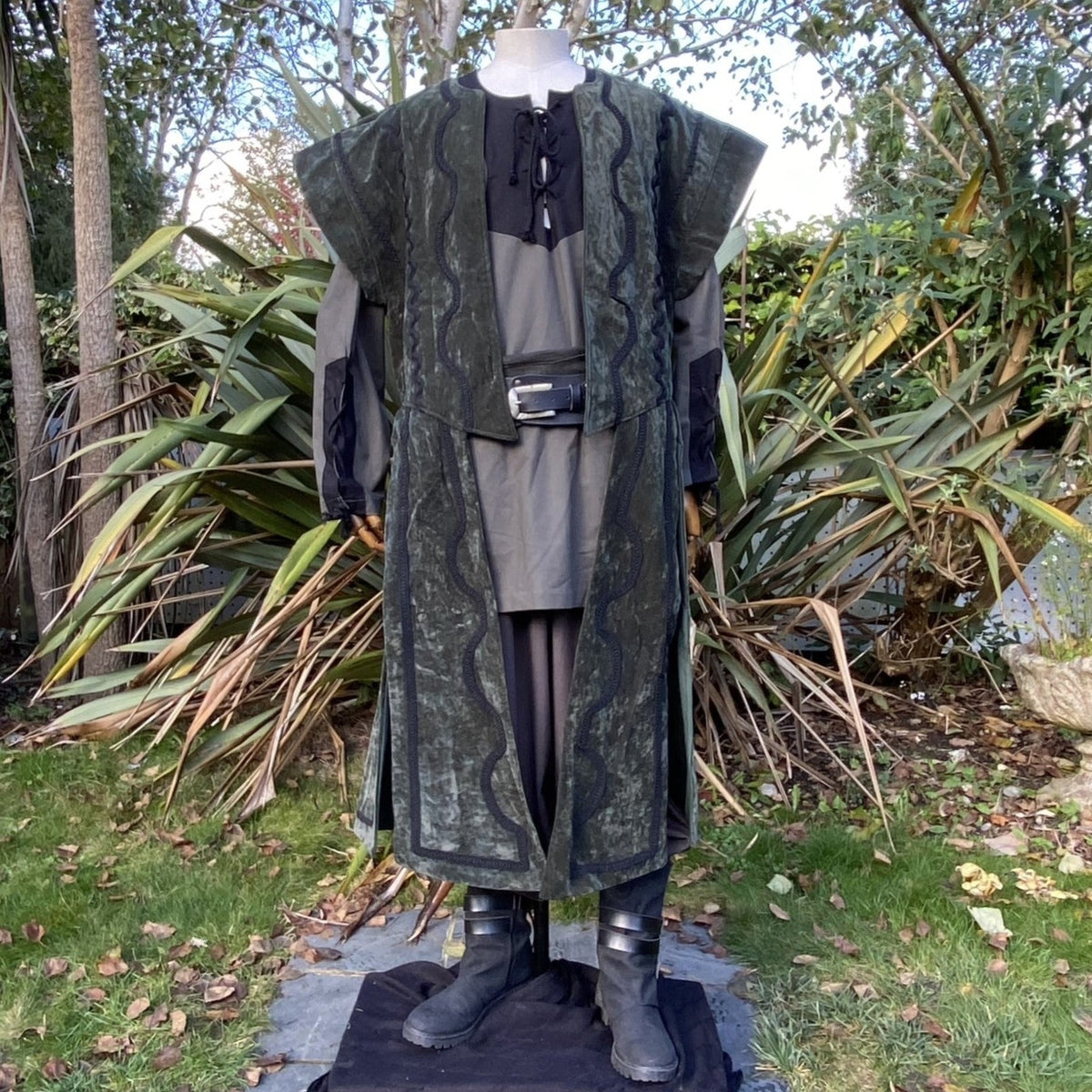 Green suede-effect wizard waistcoat with ornate braiding and flowing panels for LARP and fantasy.