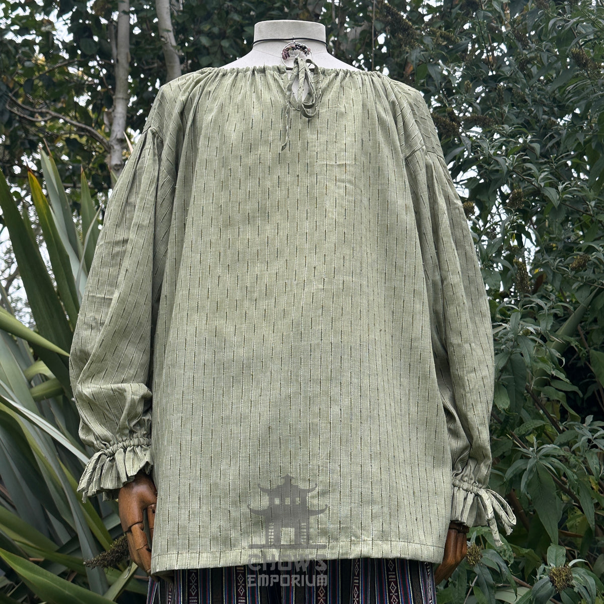 LARP medieval outfit with green shirt and striped pants, front view.