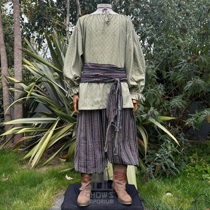 Medieval LARP outfit front view, featuring a green shirt, striped trousers and sash. For Renaissance Faire and historical roleplay events.