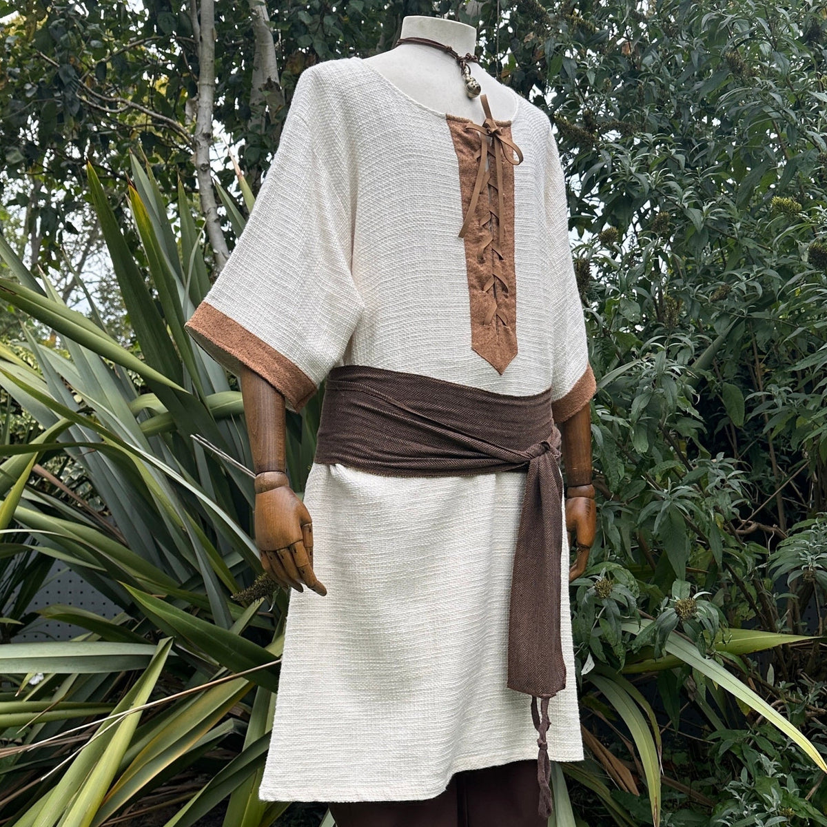 woven medieval tunic in white and brown for fantasy costume.