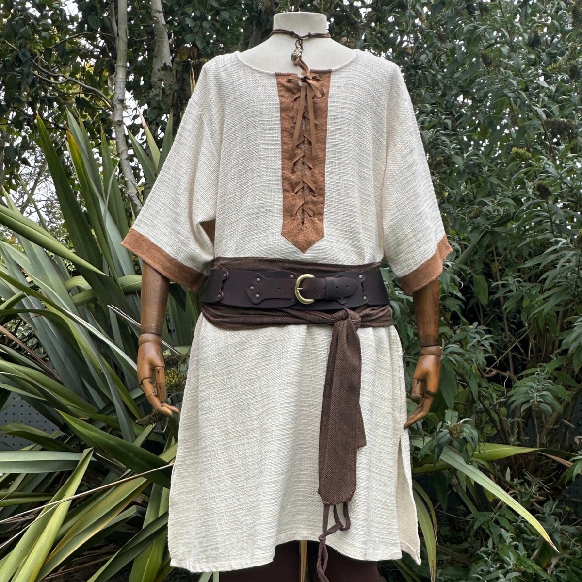 White and brown woven medieval tunic for LARP, belted, front view.