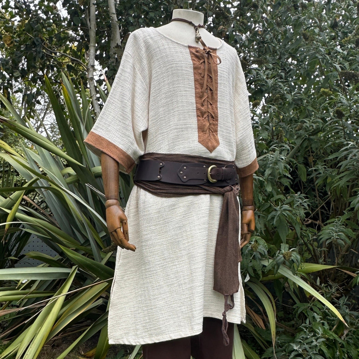 White and brown woven medieval tunic with belt for LARP, front view.