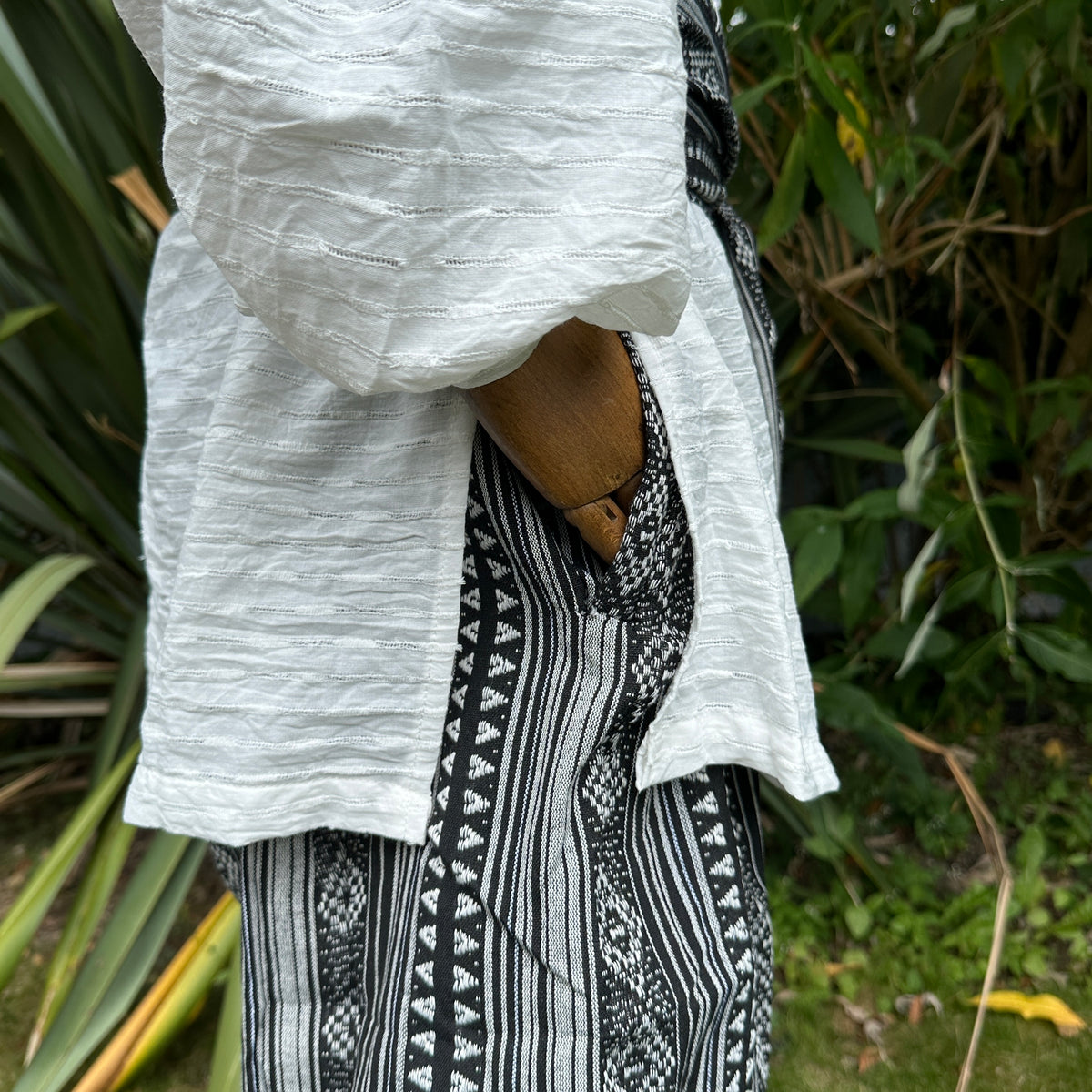 Textured white cotton linen medieval shirt side view for LARP events.