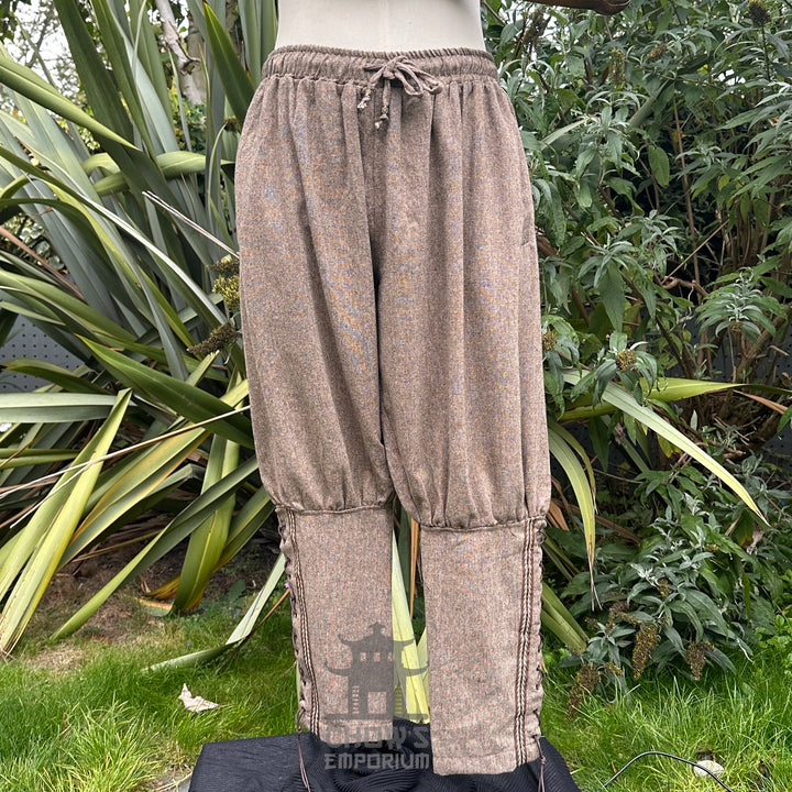 medieval brown wool trousers with braiding trim